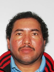 Police Seek Fugitive