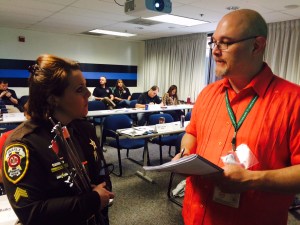 Officers asked Sgt. Fary questions about the Project Lifesaver program.