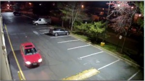 Older red vehicle (Surveillance Photo) 