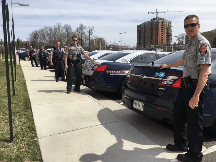Officers with cruiser magnet