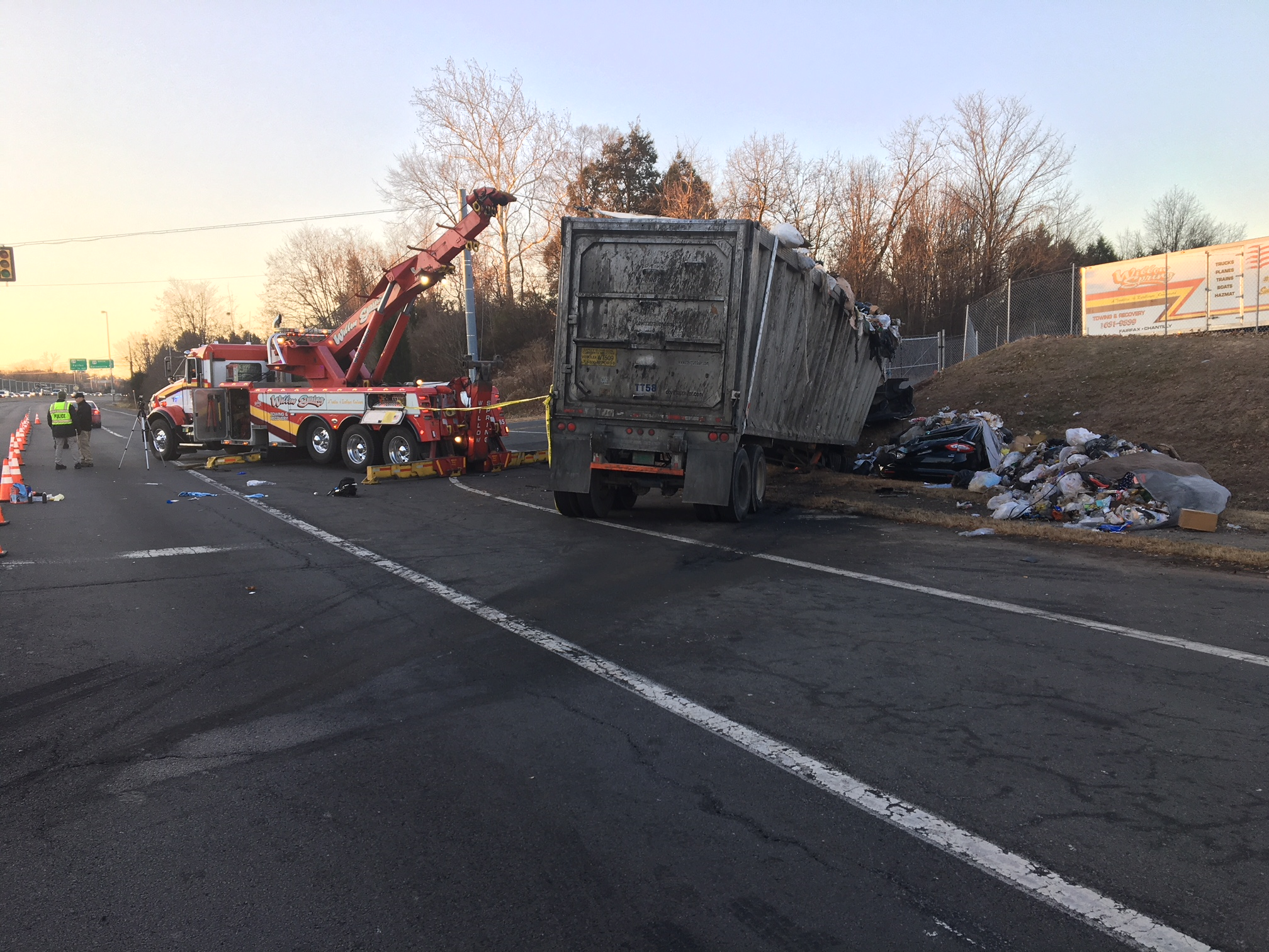 Major Traffic Delays After Dump Truck Traps Driver and Officer Hit While Directing Traffic